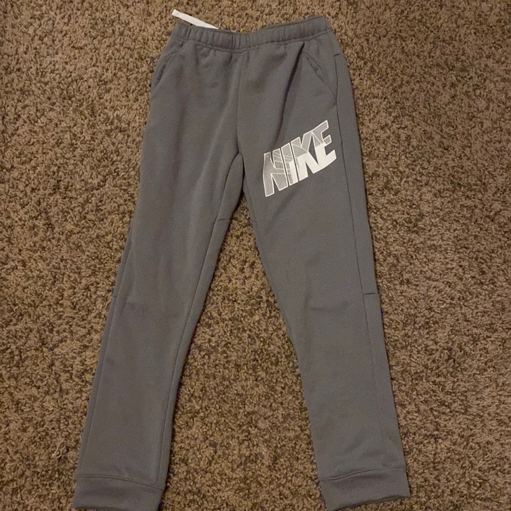 Worn once but they look brand new Nike pants with white Nike